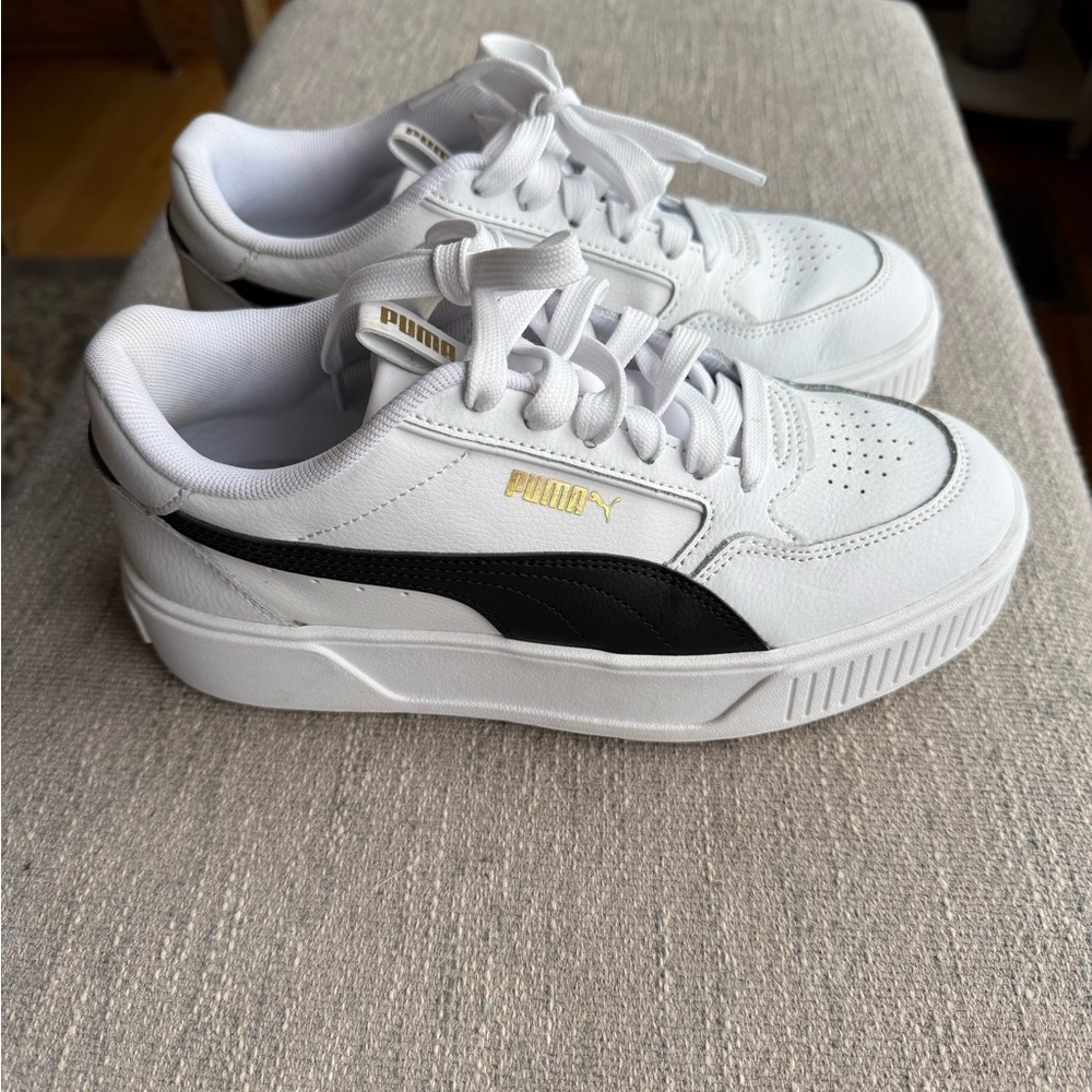 Puma White Sneakers with Black and Gold Accents